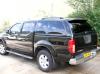 Alpha Canopy fitted to a  Nissan Navara D40 colour coded  Metallic Black