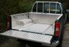 Nissan Navara D40 Extra Cab fitted with Lining, Ladder Rack and Tool Box.