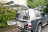 Mobile Forge, slide out drawers, lift up side and  rear doors.