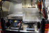 slide out drawers with anvil and Baldor fitted to fronts.