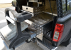 Slide out drawer with horse shoe housing and front plate to fit the anvil.