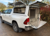 Canopy, Side pockets & Bespoke fully lockable drawer system, with room left in the centre to house equipment.