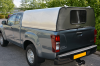 Isuzu Xcab Agrican Canopy with a solid door.