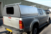 Agrican fitted with roof bars for carrying timbers and sheets.
