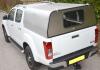 Solid with a window Agrican canopy on an Isuzu Pickup