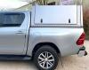 Side view of the Toyota Hilux Samson Gullwinged Canopy colour coded silver.