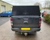 Rear view of Solid Side shown on a Ford Ranger Hardtop