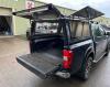 Nissan Gullwing, colour coded, lift up sode doors, life up rear doors, shiwn on a double cab 