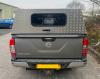 Nissan Gullwing, cheuqer plate rear door, rear window, shown on a double cab