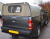 Toyota Hilux Agrican fitted with a  Solid rear door and window.
