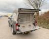Canopy with dog kennel, side storage and drawer system